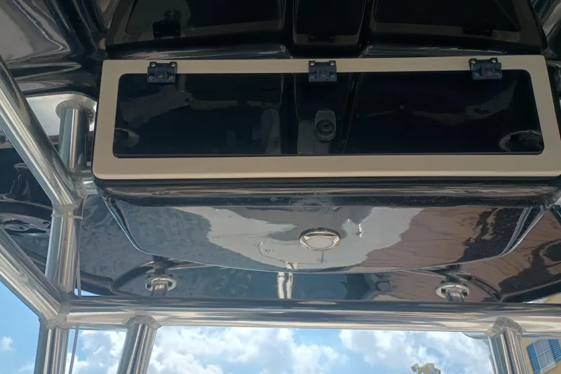 Slide: The Image of 2022 Sea Chaser 22 HFC boat console with storage compartment and stainless steel frame. - 15