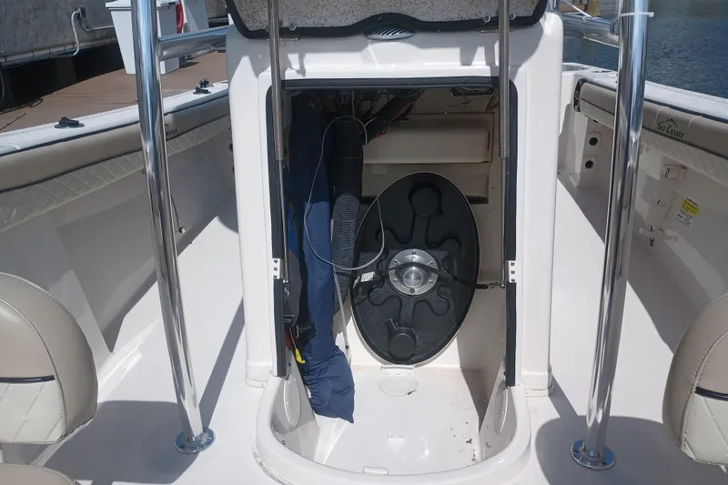 Slide: The Image of 2022 Sea Chaser 22 HFC boat interior storage compartment with equipment and accessories. - 20