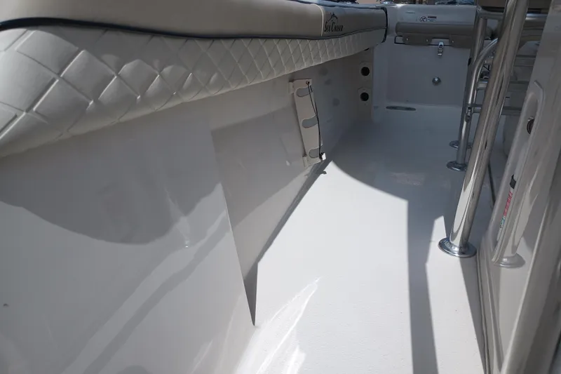 Slide: The Image of Interior view of 2022 Sea Chaser 22 HFC boat, featuring sleek design and seating. - 32