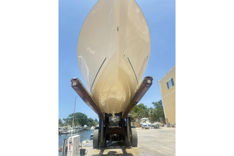 Slide: The Image of 2022 Sea Chaser 22 HFC boat on trailer, viewed from below, sunny day. - 34