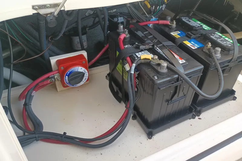 Slide: The Image of Battery compartment of a 2022 Sea Chaser 22 HFC boat with wiring and switch. - 7