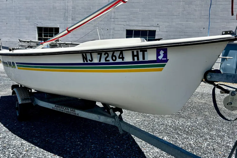 Slide: The Image of 2018 American Sail 14.6 boat on trailer, registration NJ 7264 HT. - 3