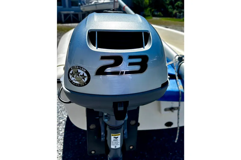 Slide: The Image of Outboard motor with "23" label on American Sail 14.6, 2018 model. - 8