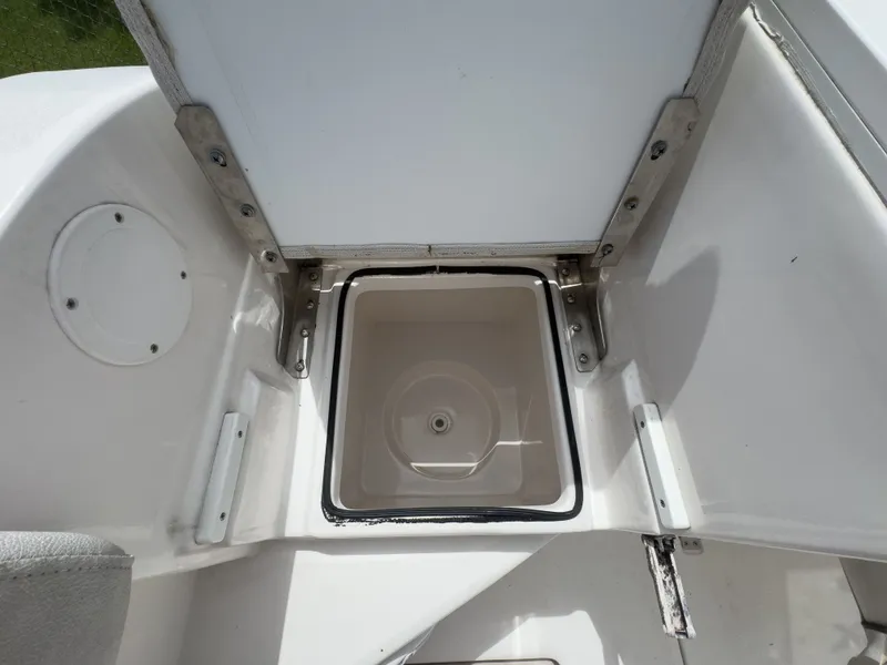 Slide: The Image of Open storage compartment on a 2022 Sea Fox 288 Commander boat. - 16