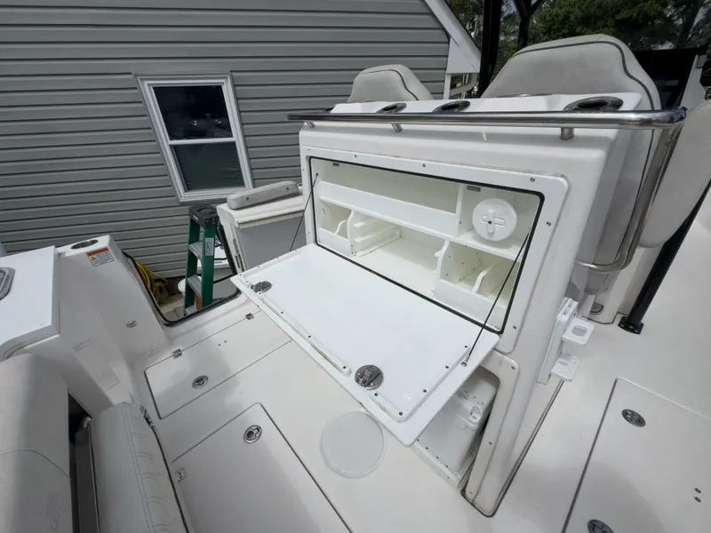 Slide: The Image of Sea Fox 288 Commander 2022 with open storage compartment. - 20