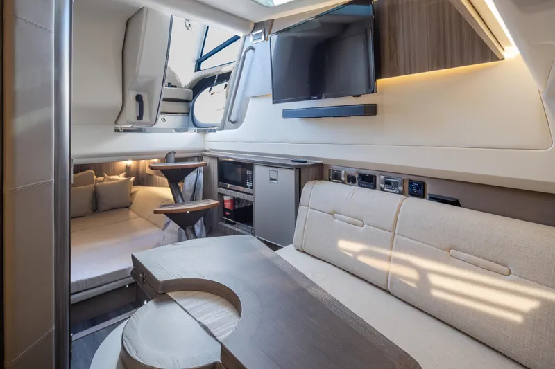 Slide: The Image of Luxurious interior of 2025 Sea Ray SLX 400 yacht with modern amenities and elegant design. - 15