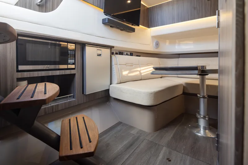 Slide: The Image of Luxurious interior of 2025 Sea Ray SLX 400 yacht with modern amenities. - 16