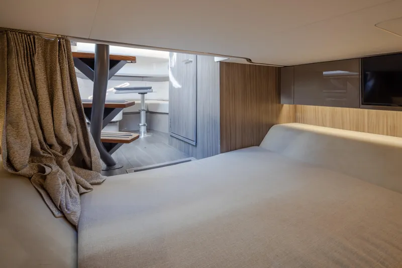 Slide: The Image of Luxurious interior cabin of 2025 Sea Ray SLX 400 yacht with modern furnishings. - 19