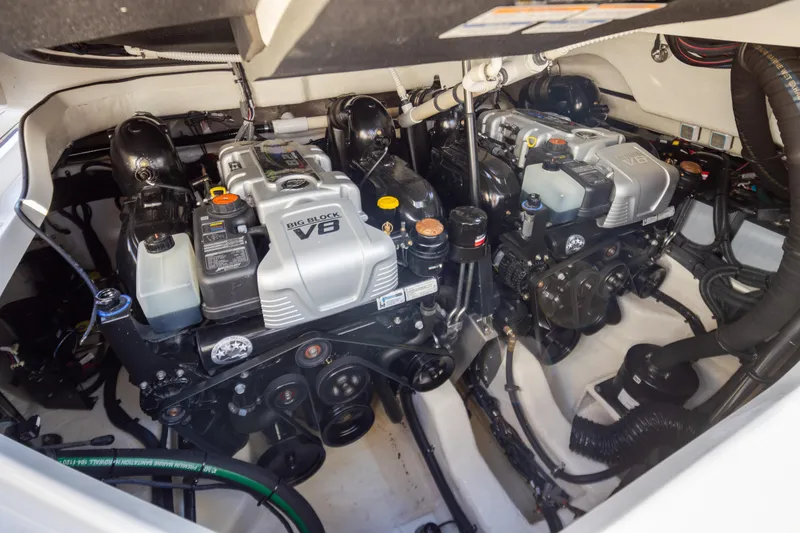 Slide: The Image of Engine compartment of 2025 Sea Ray SLX 400 with dual V8 engines. - 20