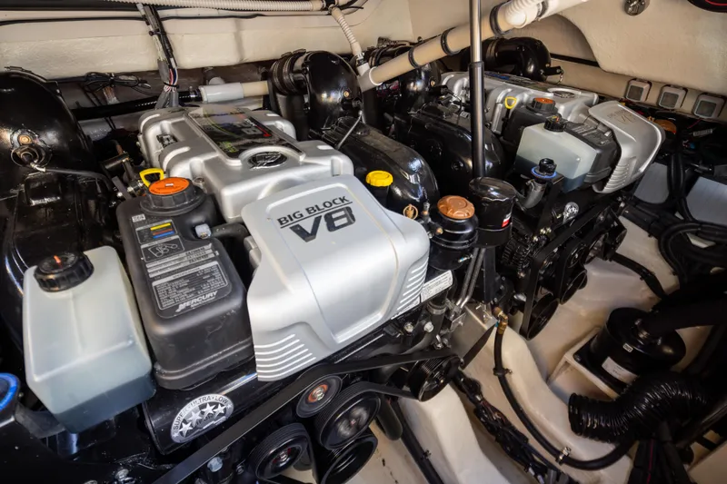 Slide: The Image of Engine room of 2025 Sea Ray SLX 400 with dual Big Block V8 engines. - 21