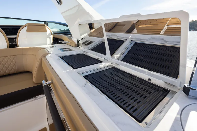 Slide: The Image of Luxurious 2025 Sea Ray SLX 400 yacht interior with sleek seating and modern amenities. - 30