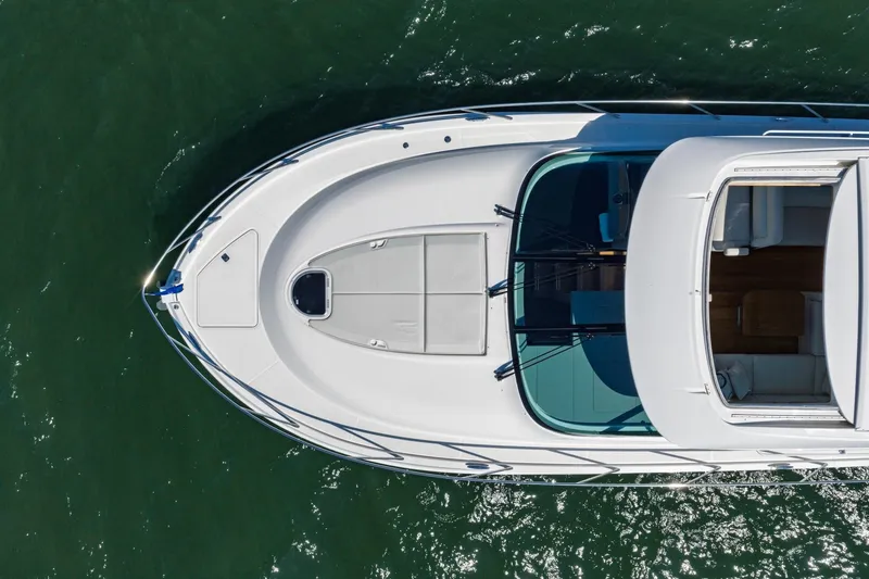 Slide: The Image of Aerial view of 2020 Tiara Yachts C53 Coupe on water. - 22
