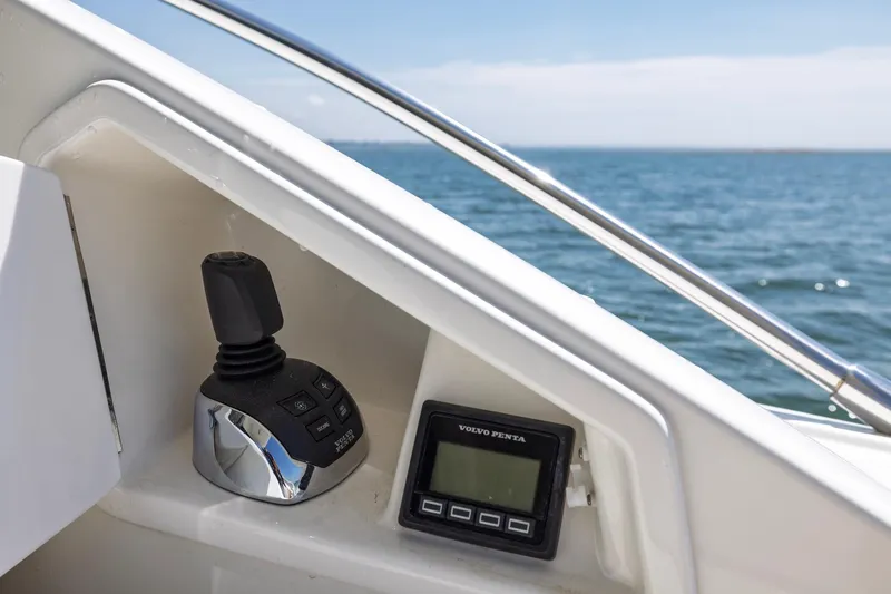 Slide: The Image of Control panel of 2020 Tiara Yachts C53 Coupe with Volvo Penta display, ocean view. - 31