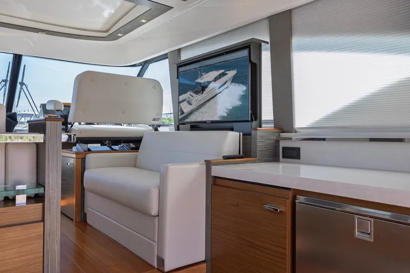 Slide: The Image of Luxurious interior of 2020 Tiara Yachts C53 Coupe with modern seating and entertainment system. - 41