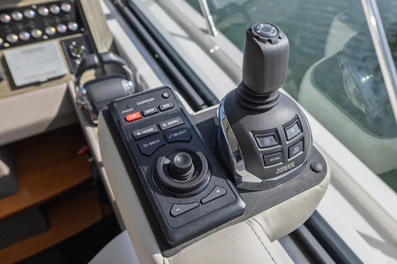 Slide: The Image of Control panel of 2020 Tiara Yachts C53 Coupe with Garmin and Volvo Penta systems. - 50
