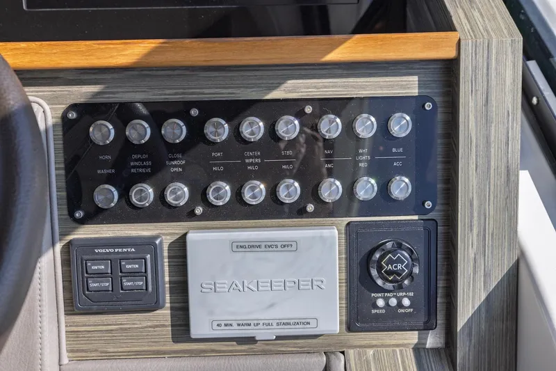 Slide: The Image of Control panel of a 2020 Tiara Yachts C53 Coupe with Seakeeper stabilization system. - 52