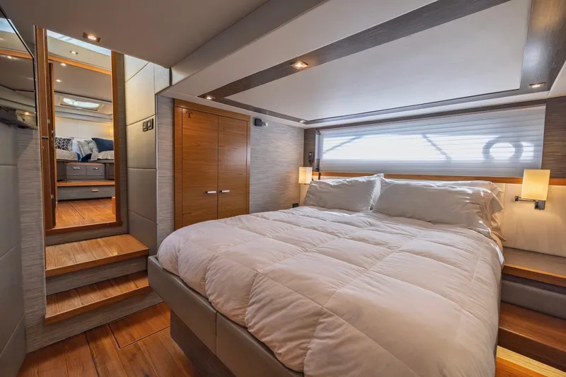 Slide: The Image of Luxurious bedroom interior of 2020 Tiara Yachts C53 Coupe with elegant wood finishes. - 60