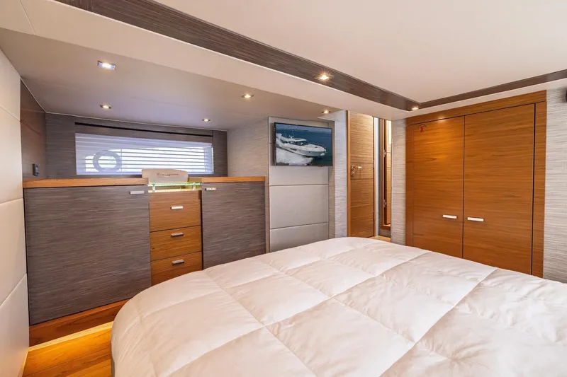 Slide: The Image of Luxurious bedroom interior of 2020 Tiara Yachts C53 Coupe with modern wood finishes. - 61