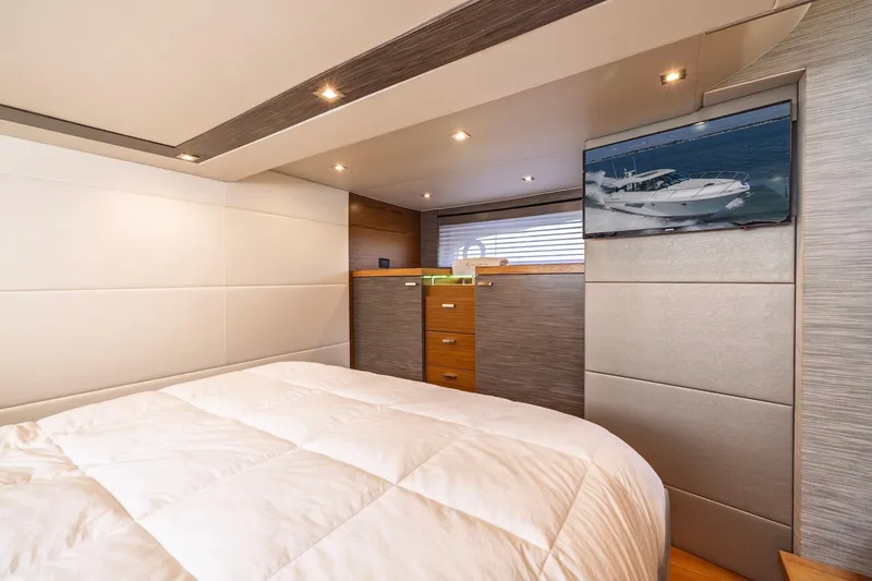 Slide: The Image of Luxurious bedroom interior of 2020 Tiara Yachts C53 Coupe with modern design and TV. - 62