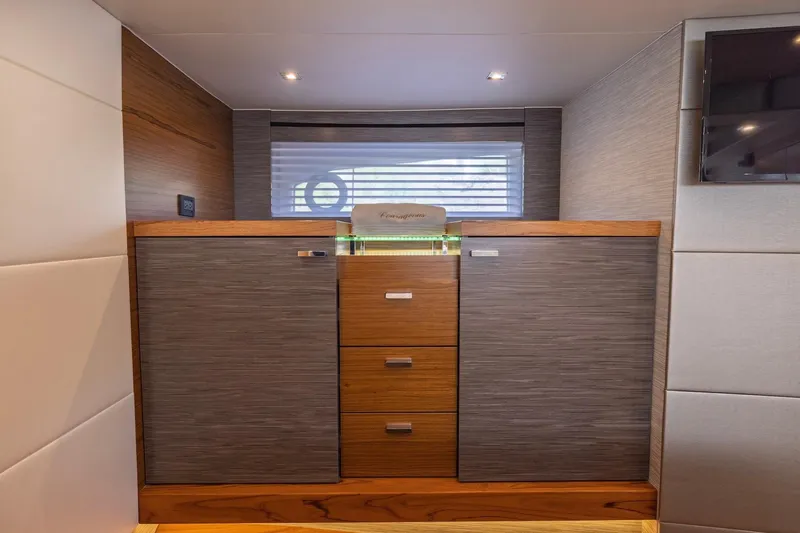 Slide: The Image of Interior of 2020 Tiara Yachts C53 Coupe featuring modern cabinetry and sleek design. - 63