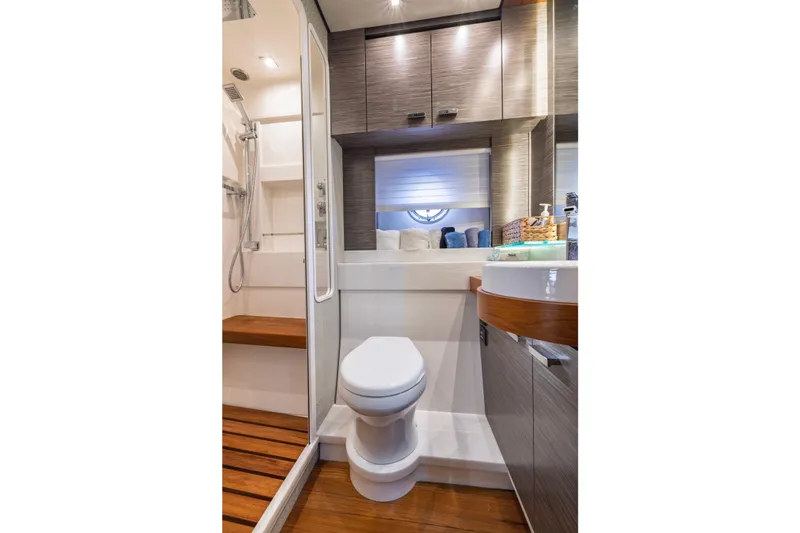 Slide: The Image of Luxurious bathroom interior of 2020 Tiara Yachts C53 Coupe with modern fixtures. - 67