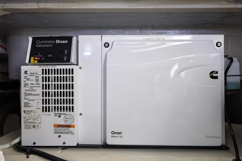 Slide: The Image of Cummins Onan generator in 2020 Tiara Yachts C53 Coupe engine room. - 84