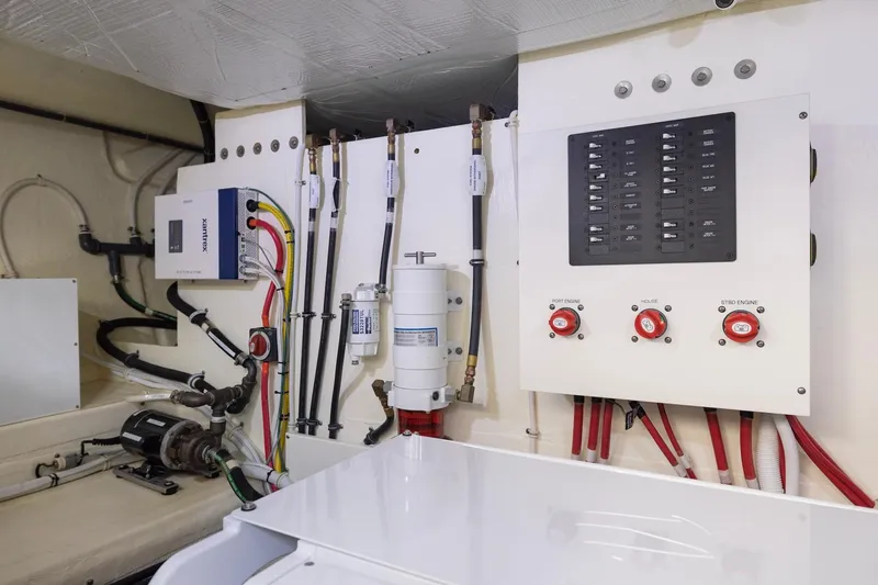 Slide: The Image of Electrical panel and wiring in 2020 Tiara Yachts C53 Coupe engine room. - 87
