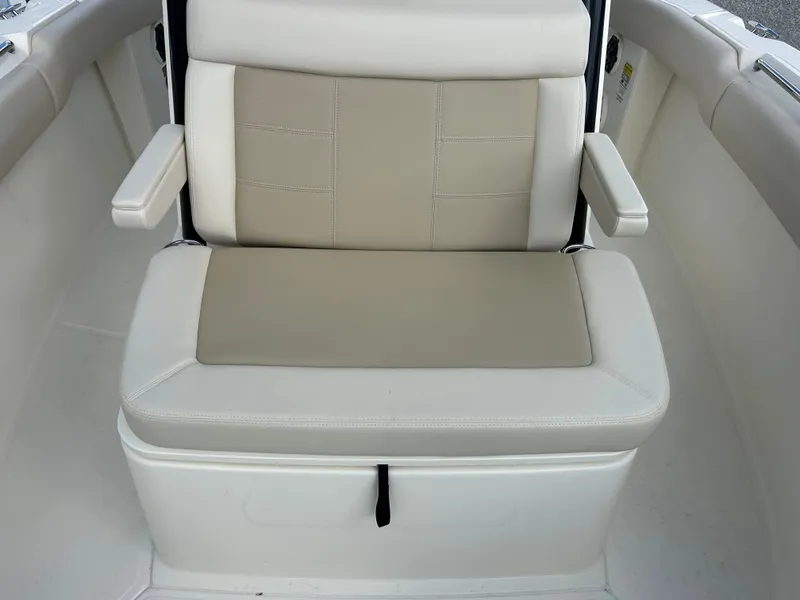 Slide: The Image of Bench seat on a 2027 Boston Whaler 250 Outrage with beige upholstery. - 23