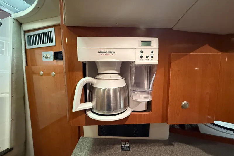 Slide: The Image of Built-in coffee maker in 2005 Maxum 3300 SCR yacht kitchen. - 36
