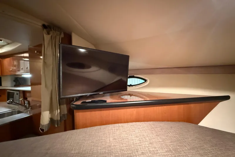 Slide: The Image of Interior of 2005 Maxum 3300 SCR yacht with TV and kitchenette. - 41