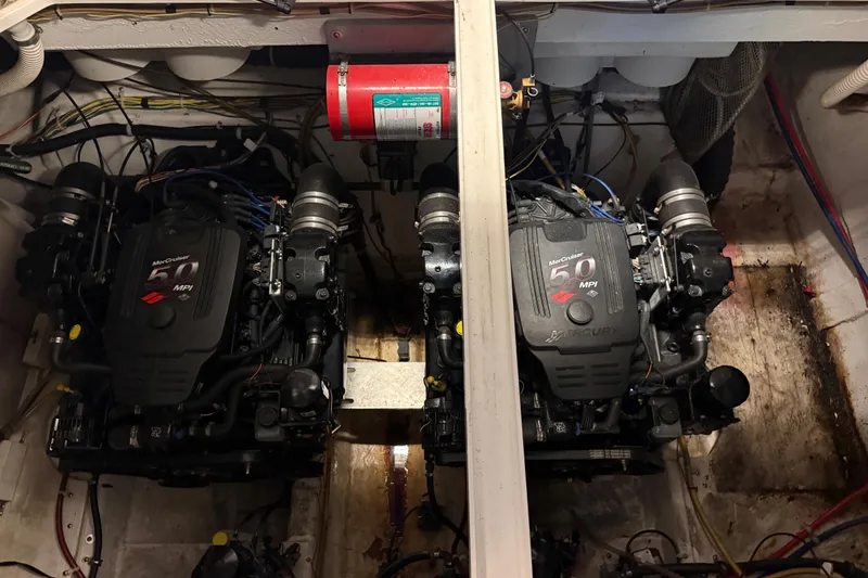 Slide: The Image of Engine compartment of a 2005 Maxum 3300 SCR with twin MerCruiser 5.0 MPI engines. - 56
