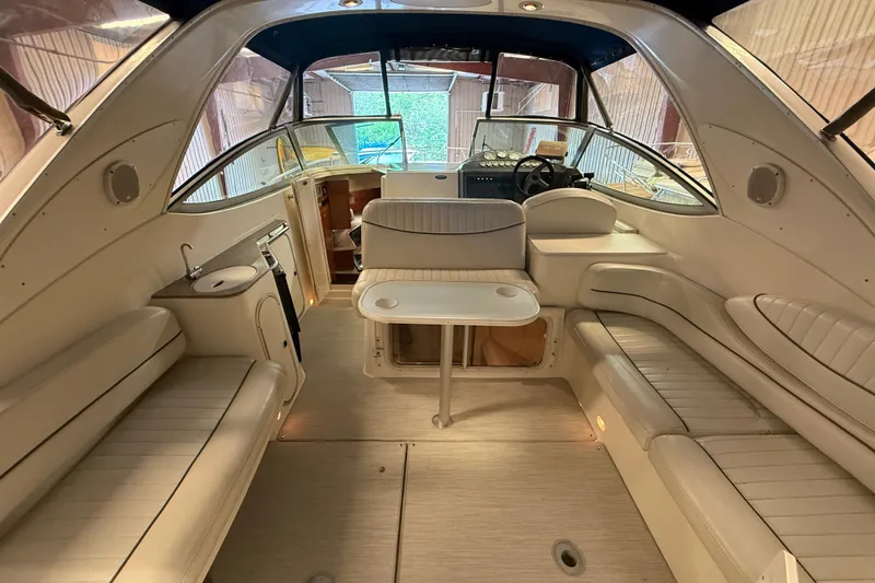 Slide: The Image of Interior of 2005 Maxum 3300 SCR boat with seating and helm. - 6