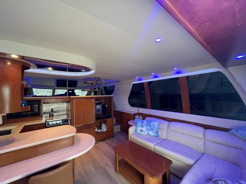 Slide: The Image of Luxurious interior of 1998 Carver 530 Voyager Pilothouse with modern furnishings and ambient lighting. - 36