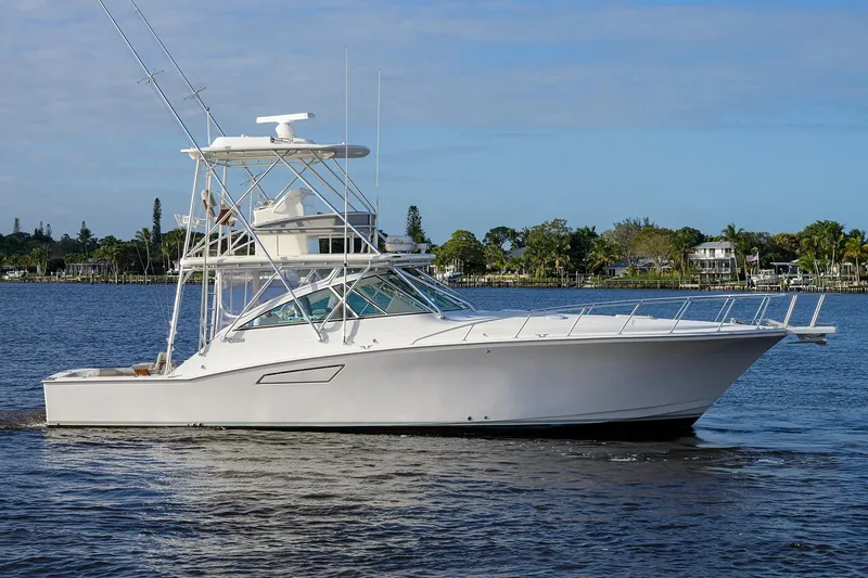 The Image of 2005 Cabo Express boat on calm water. - 0