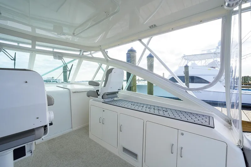 Slide: The Image of Interior of a 2005 Cabo Express yacht at the dock. - 14