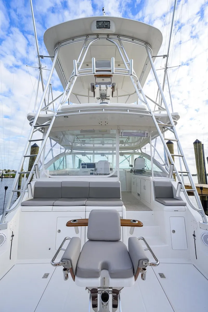 Slide: The Image of Cabo Express 2005 boat with spacious deck and seating area. - 24