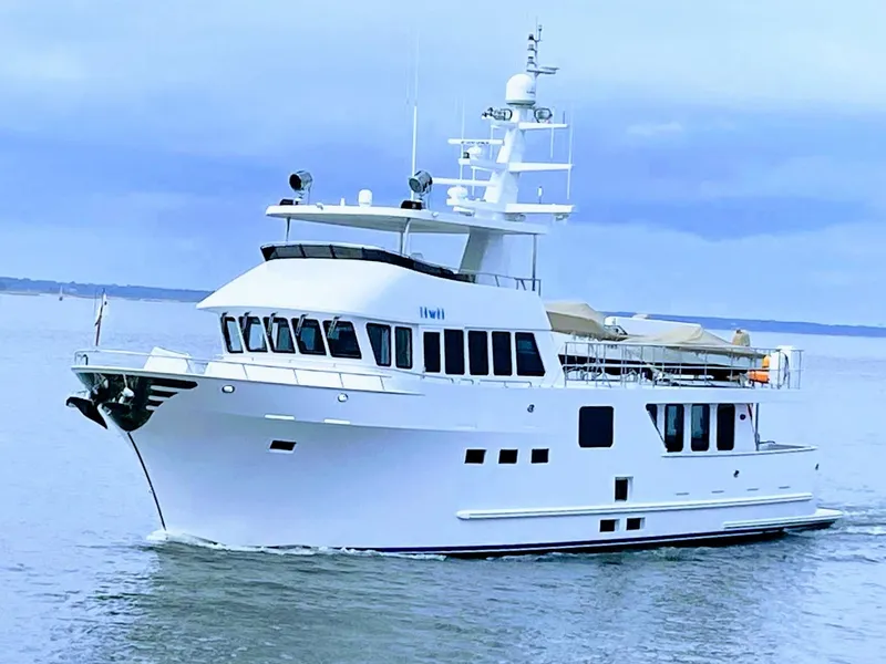 The Image of 2017 Northern Marine Expedition yacht cruising on calm waters under a cloudy sky. - 0