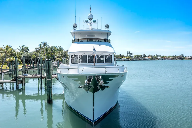 Slide: The Image of 2017 Northern Marine Expedition yacht docked in a serene marina setting. - 6