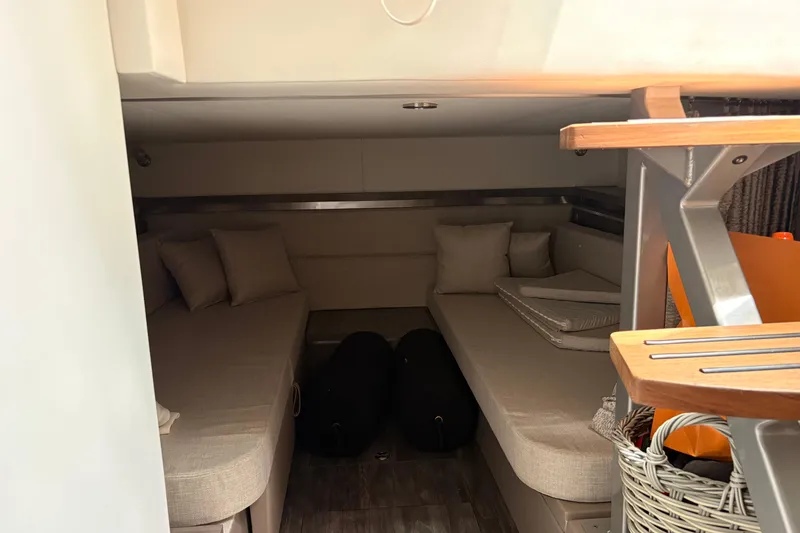 Slide: The Image of Interior cabin of 2026 Sea Ray Sundancer 320 with twin beds and modern decor. - 17