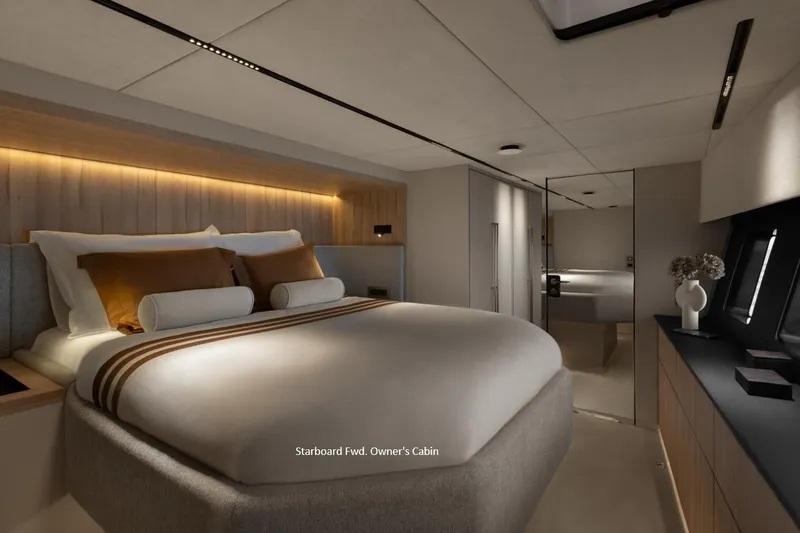 Slide: The Image of Luxurious owner's cabin in 2025 Moon 60 yacht, featuring modern design and ambient lighting. - 15