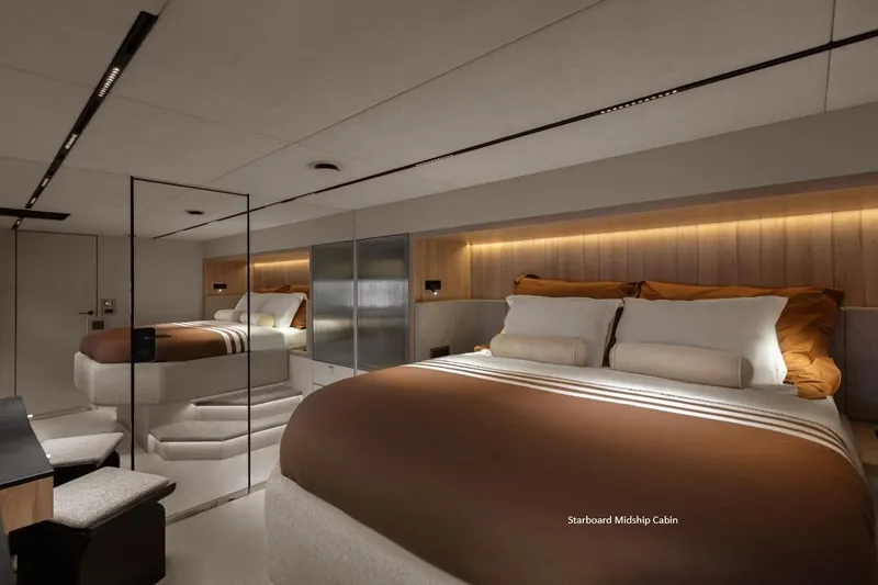 Slide: The Image of Luxurious 2025 Moon 60 yacht cabin with modern design and ambient lighting. - 18
