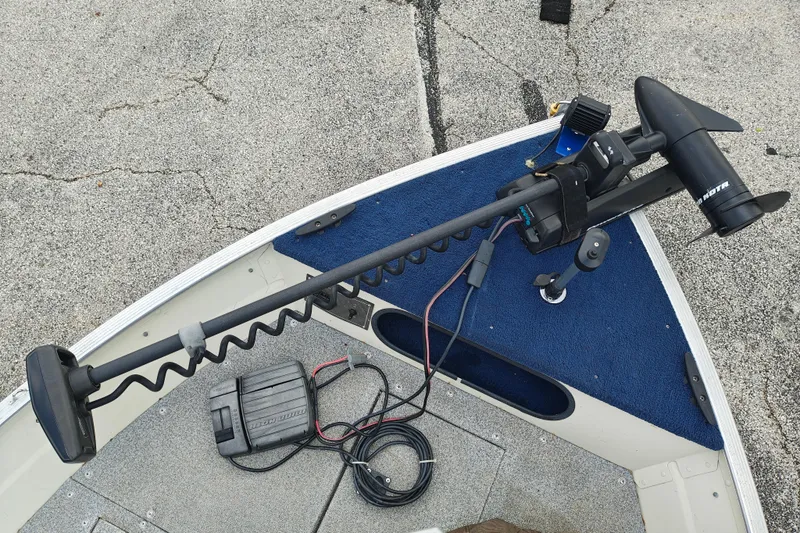 Slide: The Image of 1999 LOWE BOATS SEA NYMPH V-148SC with trolling motor on deck. - 8