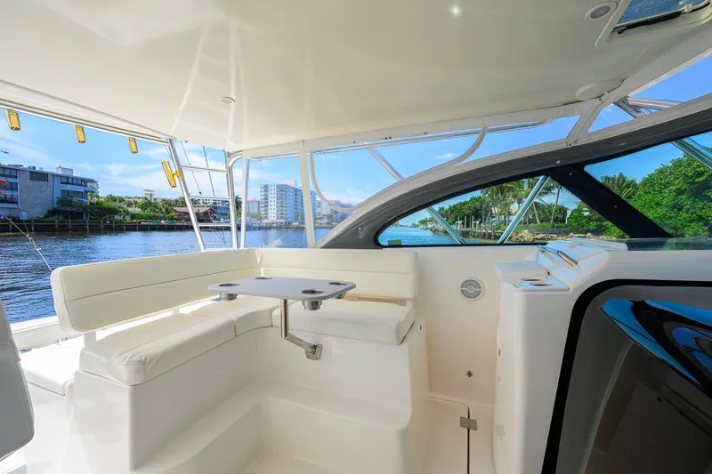 Slide: The Image of Luxurious 2004 Pursuit 3800 Express yacht interior with waterfront view. - 25