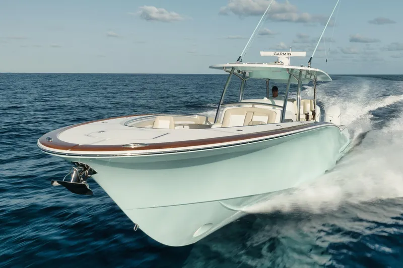 The Image of Manufacturer Provided Image: 2025 Mag Bay 43 CC boat cruising on open ocean waters. - 0