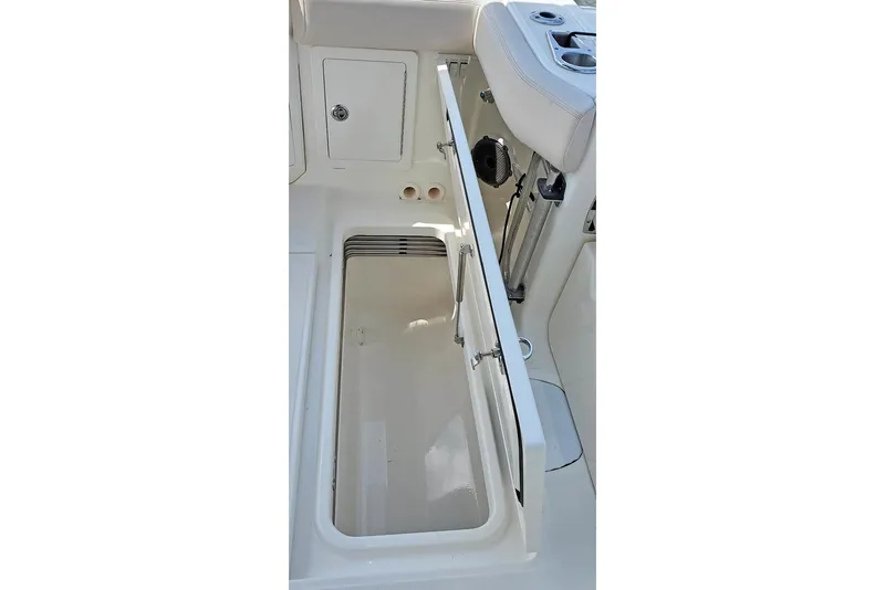 Slide: The Image of Manufacturer Provided Image: 2024 Boston Whaler 405 Conquest storage compartment and seating area. - 16