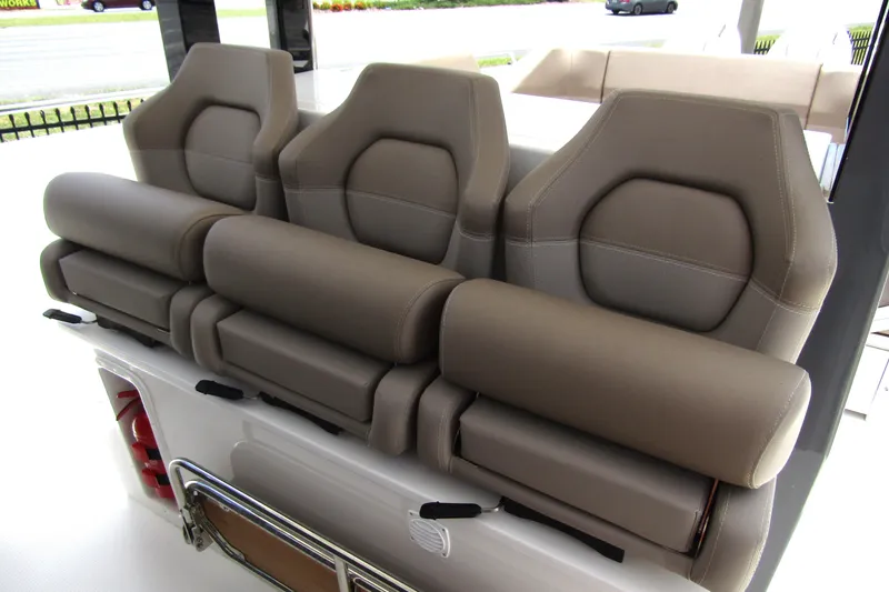 Slide: The Image of Three luxurious seats on a 2025 Nimbus Tender 11 boat, featuring ergonomic design. - 12