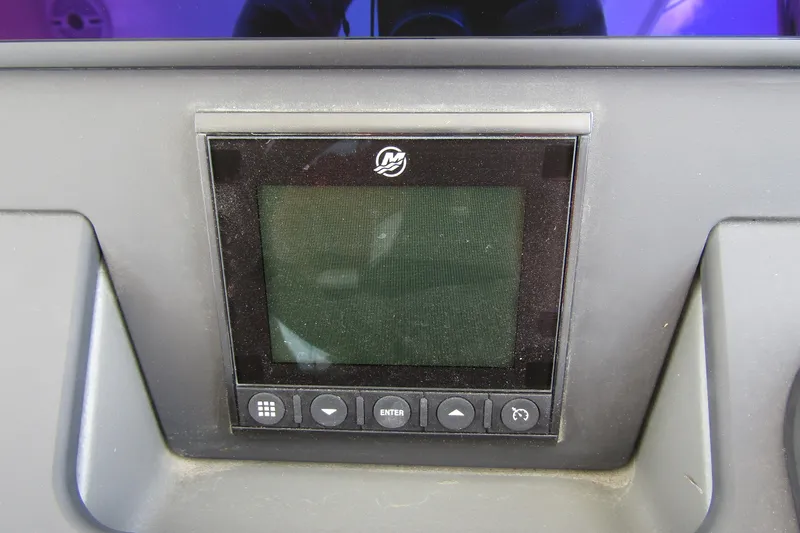 Slide: The Image of Dashboard display of 2025 Nimbus Tender 11 boat with control buttons. - 16