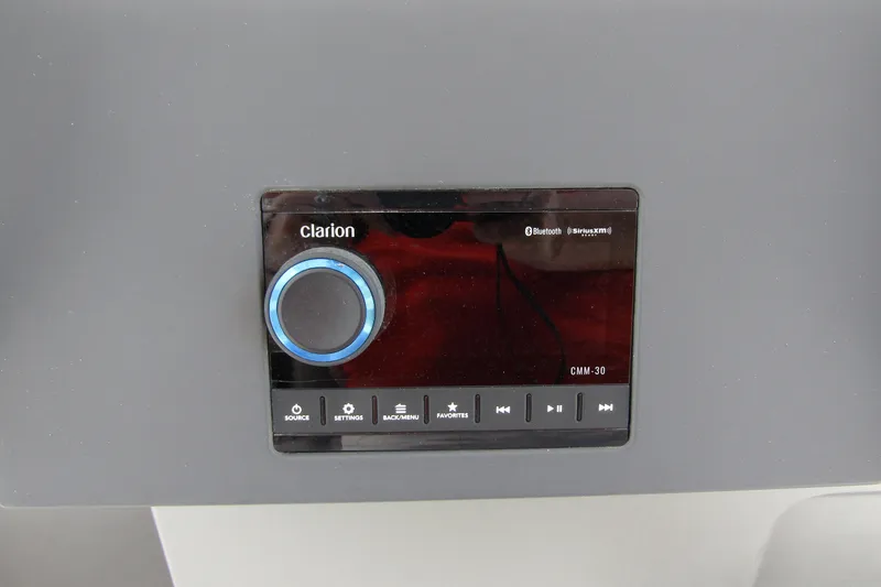 Slide: The Image of Clarion CMM-30 audio system on 2025 Nimbus Tender 11 boat dashboard. - 20