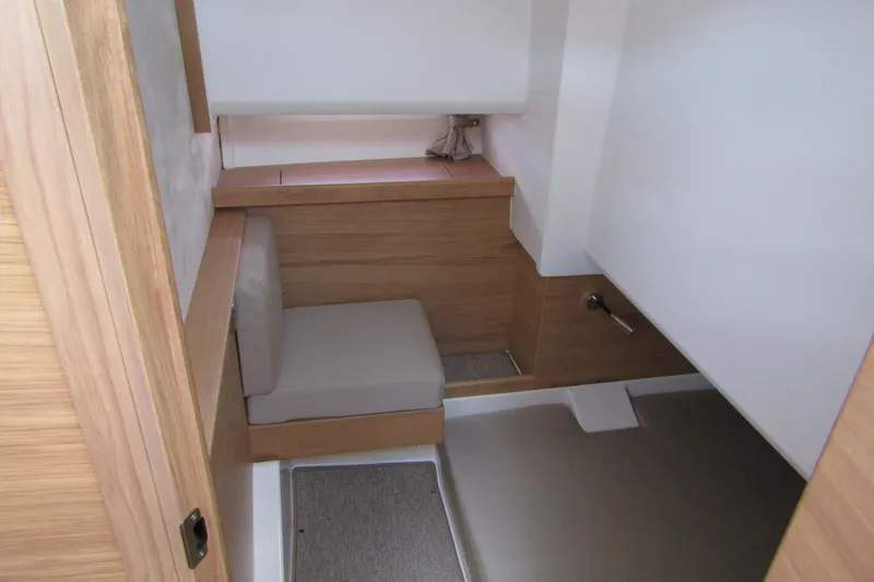 Slide: The Image of Interior of 2025 Nimbus Tender 11, featuring modern wood and white design. - 31