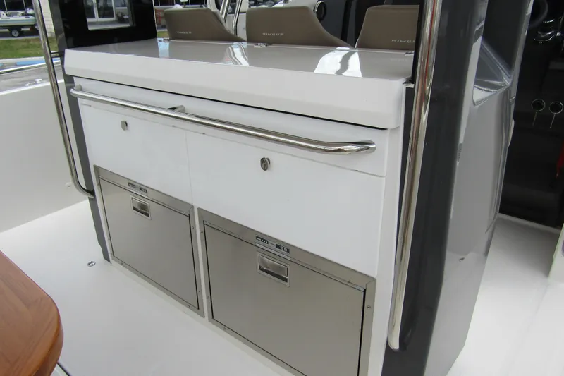 Slide: The Image of Interior of 2025 Nimbus Tender 11 boat featuring sleek storage compartments. - 36